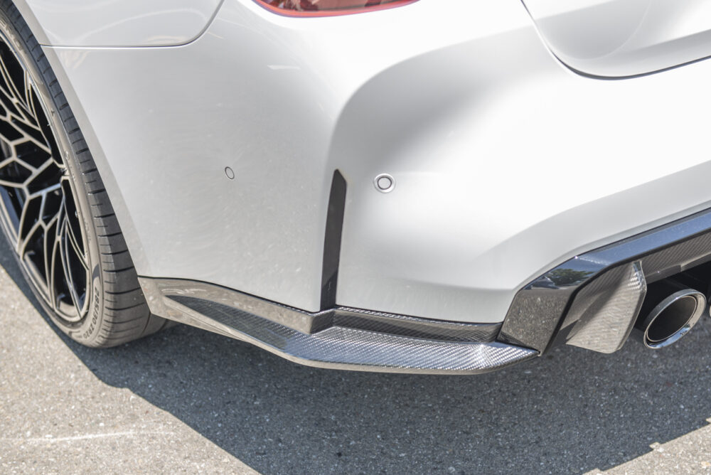 Technica AP 2021-2025 BMW G82 G83 M4 Carbon Fiber Rear Apron Lip Splitter - Image 2