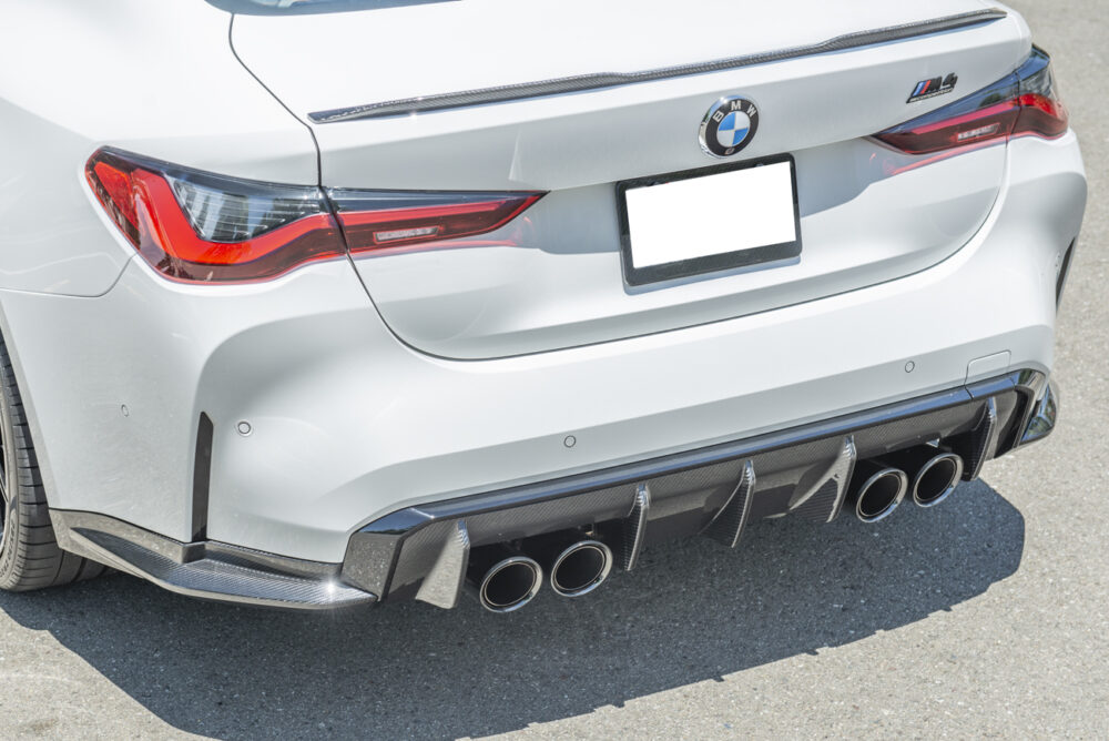 Technica AP 2021-2025 BMW G82 G83 M4 Carbon Fiber Rear Apron Lip Splitter - Image 3